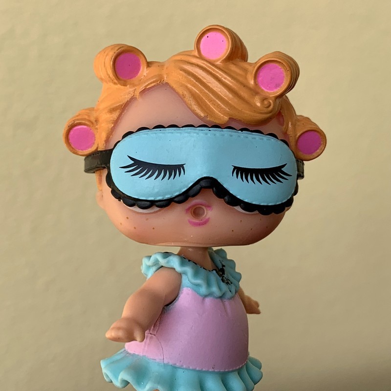 lol doll with hair curlers